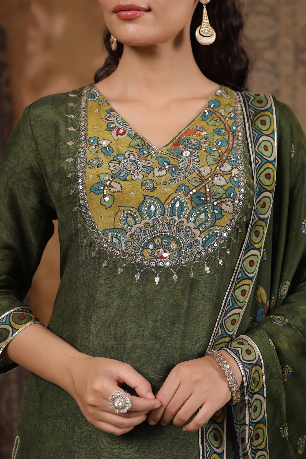 Bottle Green Natural Crape Suit with Kalamkari Print & Gota Patti Detailing