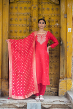 Red Dola Silk Suit with Hand-Embroidered Neckline & Banarasi Dupatta
